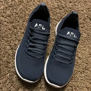APL Blue Athletic Shoes with Breathable Knit and White Sole