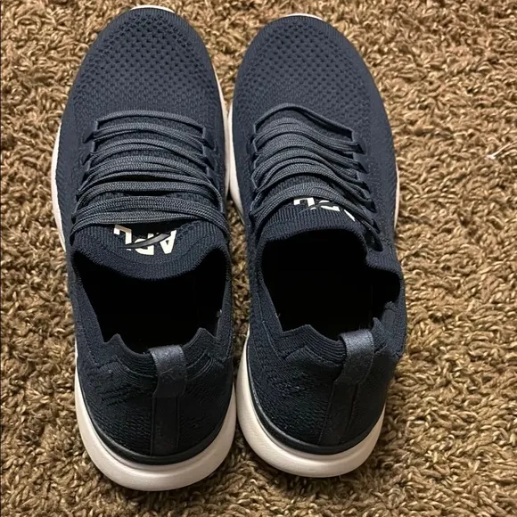 APL Blue Athletic Shoes with Breathable Knit and White Sole