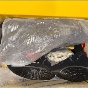 Black Athletic Shoes with Mesh Upper and Textured Sole