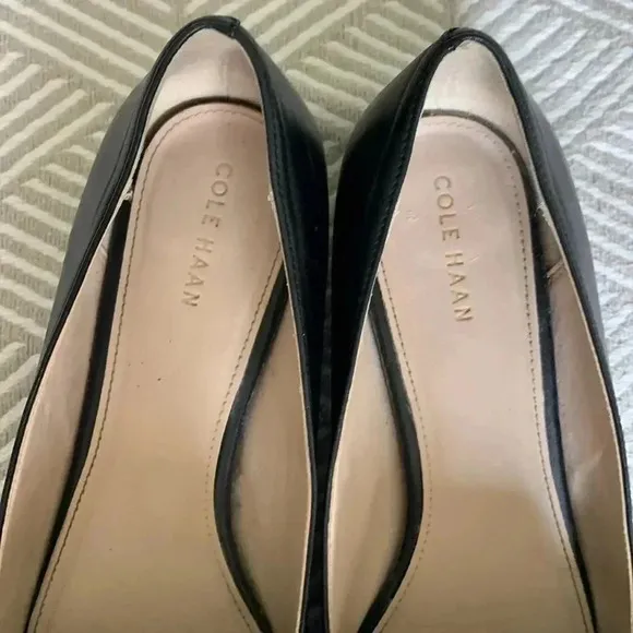 Cole Haan black pointed toe shoes