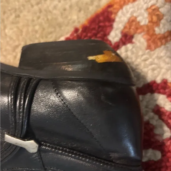 Elegant Black Leather Women's cowboy Boots boots on the ground