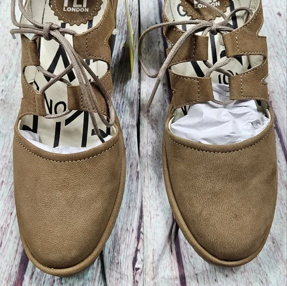 Fly London | Leather Tie Front Wedge in Sand
