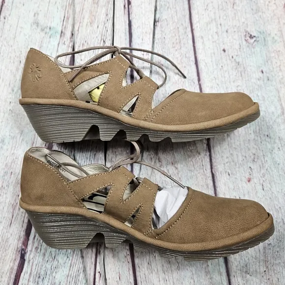 Fly London | Leather Tie Front Wedge in Sand