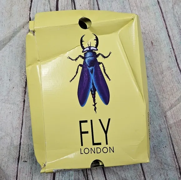 Fly London | Leather Tie Front Wedge in Sand
