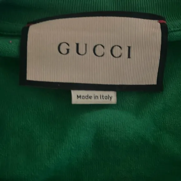 Gucci white and green shoes on page