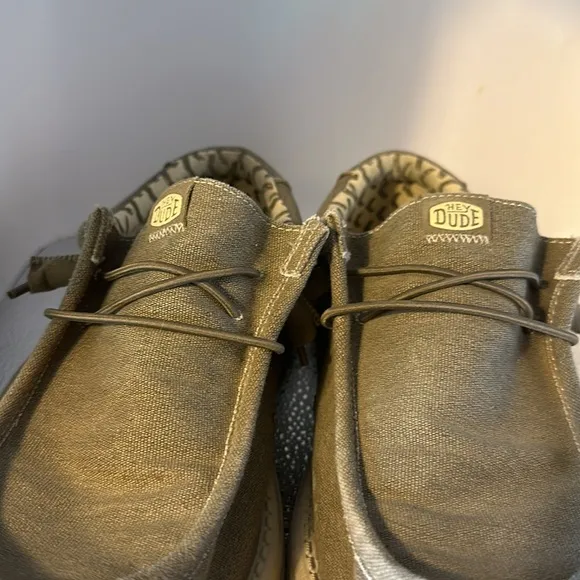 Hey dude, men’s size 10 shoes. In good used condition. Slip ons a tan color.