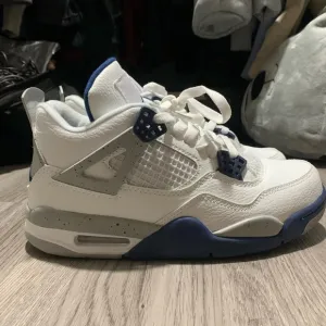 Jordan White and Blue Sneakers with Classic Design