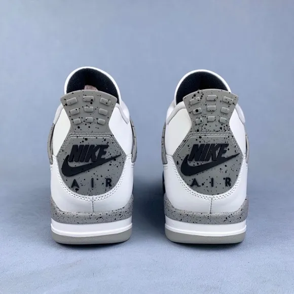 Nike White and Gray Sneakers with Iconic Design