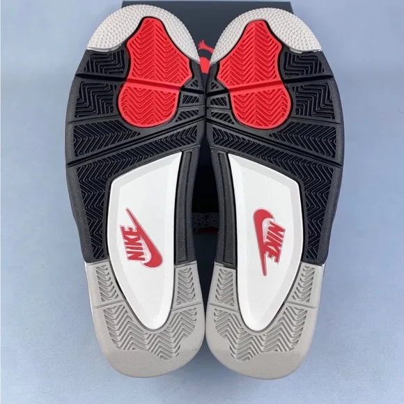 Nike White and Gray Sneakers with Iconic Design