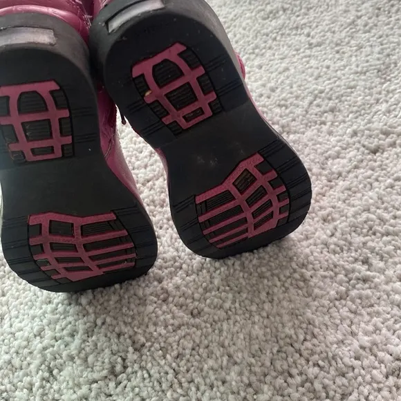 Pink cowboy boots that light up when you stomp them on the floor!