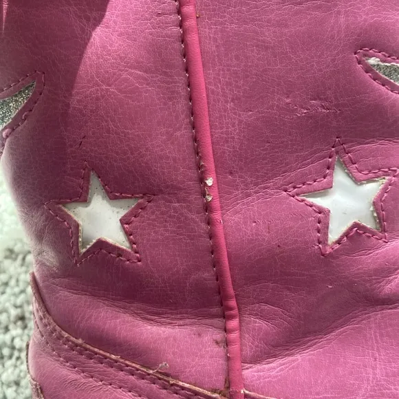 Pink cowboy boots that light up when you stomp them on the floor!