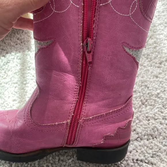 Pink cowboy boots that light up when you stomp them on the floor!