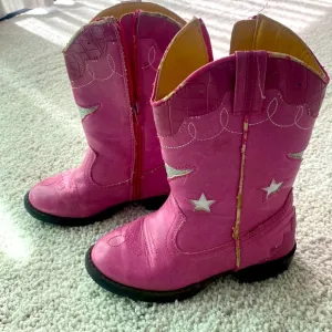 Pink cowboy boots that light up when you stomp them on the floor!