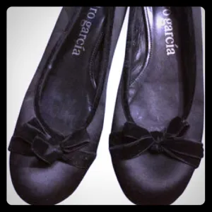 Satin Pedro Garcia flats with bow accents