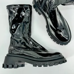 SCHUTZ Kendy Patent Leather Lug Sole Boots in Black
