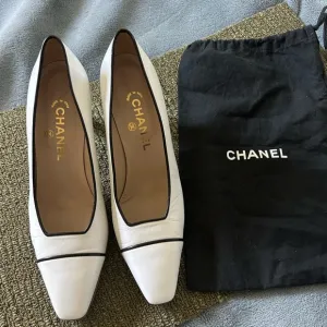 White Chanel shoes with black details, classic Chanel shoes for women